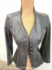 MaxSold Auction: Lot of 2 Danier Women's Genuine Leather Jackets, Red & Black - Toronto (Ontario, Canada) PARTNER MANAGED Downsizing Online Auction - Research Road (STORAGE)