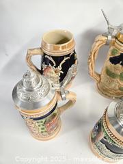 MaxSold Auction: Lot of 6 German Handgemalt Ceramic Steins with Pewter Lids - Toronto (Ontario, Canada) PARTNER MANAGED Downsizing Online Auction - Research Road (STORAGE)