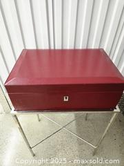 MaxSold Auction: Red Leather Jewelry/Valet Storage Box with Chrome Stand - Toronto (Ontario, Canada) PARTNER MANAGED Downsizing Online Auction - Research Road (STORAGE)