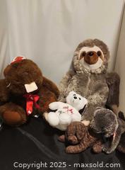 MaxSold Auction: Animal plush lot : canada beaver, sloth, bear, dogs - Toronto (Ontario, Canada) SELLER MANAGED Reseller Online Auction - Falstaff Avenue (CONDO)