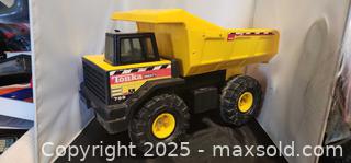 MaxSold Auction: Tonka Mighty Dump Truck 768 pressed Stee Yellow/ plastic black 1999 Vintage XMB-975 Wheels - Toronto (Ontario, Canada) SELLER MANAGED Reseller Online Auction - Falstaff Avenue (CONDO)