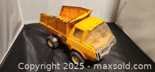 MaxSold Auction: Vintage 70's Tonka Dump Truck Golden Yellow Pressed Metal - Toronto (Ontario, Canada) SELLER MANAGED Reseller Online Auction - Falstaff Avenue (CONDO)