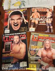 MaxSold Auction: WWE pro wrestling magazine HHH Triple H lot - Toronto (Ontario, Canada) SELLER MANAGED Reseller Online Auction - Falstaff Avenue (CONDO)