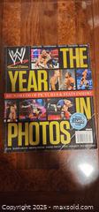 MaxSold Auction: WWE year in photos 2012 album - Toronto (Ontario, Canada) SELLER MANAGED Reseller Online Auction - Falstaff Avenue (CONDO)