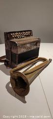 MaxSold Auction: Antique trumpet, Hohner accordion small 9x9x5 - Toronto (Ontario, Canada) SELLER MANAGED Downsizing Online Auction - Stibbard Avenue