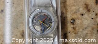 MaxSold Auction: Swatch watch from Switzerland first release 1985 - Toronto (Ontario, Canada) SELLER MANAGED Downsizing Online Auction - Stibbard Avenue