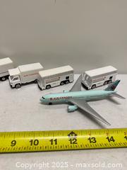 MaxSold Auction: BC Ferries & Air Canada Toy Vehicle Lot – Plane, Trucks & Cars - Vancouver (British Columbia, Canada) SELLER MANAGED Reseller Online Auction - East 7th Avenue (STORAGE)