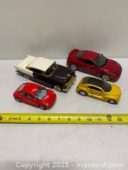 MaxSold Auction: Die-Cast Car Lot – Classic & Modern Models (4 pcs) - Vancouver (British Columbia, Canada) SELLER MANAGED Reseller Online Auction - East 7th Avenue (STORAGE)