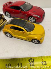 MaxSold Auction: Die-Cast Car Lot – Classic & Modern Models (4 pcs) - Vancouver (British Columbia, Canada) SELLER MANAGED Reseller Online Auction - East 7th Avenue (STORAGE)