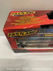 MaxSold Auction: Fastlane Truck Carry Case w/ Die-Cast Cars – 28 Pieces (Toys“R”Us) - Vancouver (British Columbia, Canada) SELLER MANAGED Reseller Online Auction - East 7th Avenue (STORAGE)
