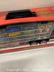 MaxSold Auction: Fastlane Truck Carry Case w/ Die-Cast Cars – 28 Pieces (Toys“R”Us) - Vancouver (British Columbia, Canada) SELLER MANAGED Reseller Online Auction - East 7th Avenue (STORAGE)