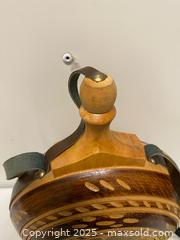 MaxSold Auction: Hand-Carved Wooden Folk Art Canteen with Leather Strap  - Vancouver (British Columbia, Canada) SELLER MANAGED Reseller Online Auction - East 7th Avenue (STORAGE)