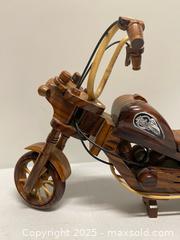 MaxSold Auction: Hand-Carved Wooden Harley-Davidson Style Motorcycle Model, approx. 14” - Vancouver (British Columbia, Canada) SELLER MANAGED Reseller Online Auction - East 7th Avenue (STORAGE)