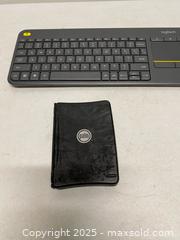 MaxSold Auction: Logitech K400 Plus Wireless Keyboard w/ Touchpad & Palm Portable Folding Keyboard – Mixed  - Vancouver (British Columbia, Canada) SELLER MANAGED Reseller Online Auction - East 7th Avenue (STORAGE)