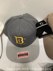MaxSold Auction: Lot of 3 Baseball Caps + New Hotel & Airline Slippers - Vancouver (British Columbia, Canada) SELLER MANAGED Reseller Online Auction - East 7th Avenue (STORAGE)
