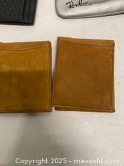 MaxSold Auction: Lot of Vintage Leather Wallets, Coin Purses & Ray-Ban Case (1970s–1990s) - Vancouver (British Columbia, Canada) SELLER MANAGED Reseller Online Auction - East 7th Avenue (STORAGE)