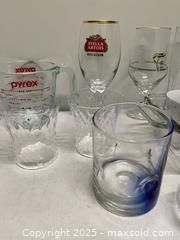 MaxSold Auction: Mixed Glassware Lot – Pyrex Measuring Cups, Beer & Wine Glasses - Vancouver (British Columbia, Canada) SELLER MANAGED Reseller Online Auction - East 7th Avenue (STORAGE)