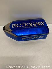 MaxSold Auction: Pictionary Collector’s Edition Board Game – Metal Tin - Vancouver (British Columbia, Canada) SELLER MANAGED Reseller Online Auction - East 7th Avenue (STORAGE)