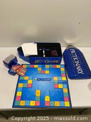 MaxSold Auction: Pictionary Collector’s Edition Board Game – Metal Tin - Vancouver (British Columbia, Canada) SELLER MANAGED Reseller Online Auction - East 7th Avenue (STORAGE)