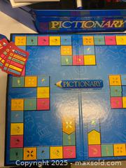 MaxSold Auction: Pictionary Collector’s Edition Board Game – Metal Tin - Vancouver (British Columbia, Canada) SELLER MANAGED Reseller Online Auction - East 7th Avenue (STORAGE)