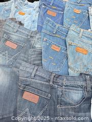 MaxSold Auction: Lot of 12 Men's Wrangler Jeans, Mostly 31 x 34 - Los Angeles (California, USA) PARTNER MANAGED Downsizing Online Auction - West 88th Place