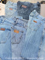 MaxSold Auction: Lot of Approximately 12 Wrangler Denim Jeans - Los Angeles (California, USA) PARTNER MANAGED Downsizing Online Auction - West 88th Place