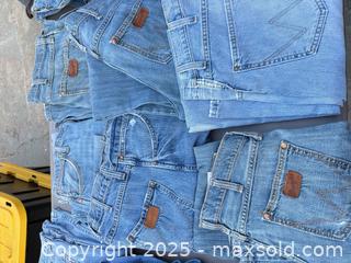 MaxSold Auction: Lot of Approximately 14 Wrangler Men's Denim Jeans - Los Angeles (California, USA) PARTNER MANAGED Downsizing Online Auction - W 88th Place