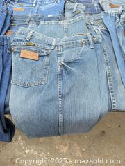 MaxSold Auction: Lot of Men's Wrangler Denim Jeans, Sizes 30/31/32/34 - Los Angeles (California, USA) PARTNER MANAGED Downsizing Online Auction - West 88th Place