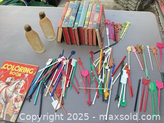 MaxSold Auction: Lot of Mid-20th Century Swizzle Sticks, Children's Books & Bottles - Los Angeles (California, USA) PARTNER MANAGED Downsizing Online Auction - West 88th Place
