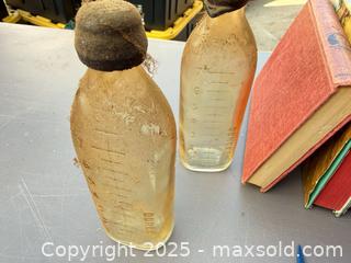 MaxSold Auction: Lot of Mid-20th Century Swizzle Sticks, Children's Books & Bottles - Los Angeles (California, USA) PARTNER MANAGED Downsizing Online Auction - West 88th Place