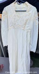 MaxSold Auction: Vintage-Style Ivory/Cream Wedding Gown with Long Lace Sleeves - Los Angeles (California, USA) PARTNER MANAGED Downsizing Online Auction - West 88th Place