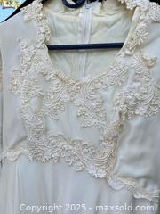 MaxSold Auction: Vintage-Style Ivory/Cream Wedding Gown with Long Lace Sleeves - Los Angeles (California, USA) PARTNER MANAGED Downsizing Online Auction - West 88th Place