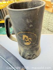 MaxSold Auction: Vintage lot: leather backpacks, rucksack, cowboy boot & accessories - Los Angeles (California, USA) PARTNER MANAGED Downsizing Online Auction - West 88th Place