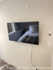 MaxSold Auction: LG 48 inch tv with mount for wall and remote - Surrey (British Columbia, Canada) SELLER MANAGED Estate Sale Online Auction - King George Boulevard (CONDO)