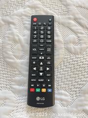 MaxSold Auction: LG 48 inch tv with mount for wall and remote - Surrey (British Columbia, Canada) SELLER MANAGED Estate Sale Online Auction - King George Boulevard (CONDO)