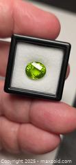 MaxSold Auction: Big AAA vivid green peridot - Toronto (Ontario, Canada) PARTNER MANAGED Reseller Online Auction - Gerrard Street East