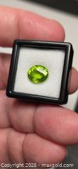 MaxSold Auction: Big AAA vivid green peridot - Toronto (Ontario, Canada) PARTNER MANAGED Reseller Online Auction - Gerrard Street East