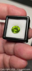MaxSold Auction: Big AAA vivid green peridot - Toronto (Ontario, Canada) PARTNER MANAGED Reseller Online Auction - Gerrard Street East