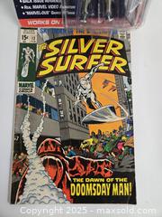 MaxSold Auction: Marvel The Silver Surfer Carded CD-ROM Figure with Comic - Toronto (Ontario, Canada) SHORT NOTICE PARTNER MANAGED Downsizing Online Auction - Research Road (STORAGE)