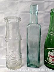 MaxSold Auction: GLASS BOTTLE LOT OF 3 - Kingston (Ontario, Canada) SELLER MANAGED Downsizing Online Auction - Rosemund Crescent