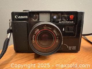 MaxSold Auction: 2 x vintage camera and zoom lens - as pictured  - Toronto (Ontario, Canada) SHORT NOTICE SELLER MANAGED Reseller Online Auction - Kempsell Crescent