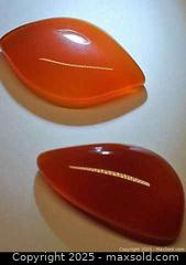 MaxSold Auction: 40.13ct natural deepOrange red toneCarnelian pair - Toronto (Ontario, Canada) SELLER MANAGED Reseller Online Auction - Cosburn Avenue (CONDO)