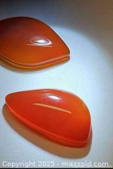 MaxSold Auction: 40.13ct natural deepOrange red toneCarnelian pair - Toronto (Ontario, Canada) SELLER MANAGED Reseller Online Auction - Cosburn Avenue (CONDO)