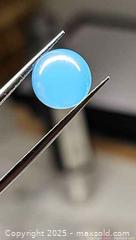 MaxSold Auction: 8.76ct natural bright icey blueChalcedony..round cabMatch pair10mm - Toronto (Ontario, Canada) SELLER MANAGED Reseller Online Auction - Cosburn Avenue (CONDO)
