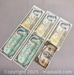 MaxSold Auction: (3) 1973 Collectible Canadian $1 Bills, (2) 1967 Collectible Canadian $1 Bills & More - Toronto (Ontario, Canada) PARTNER MANAGED Reseller Online Auction - Queen Street Wt.
