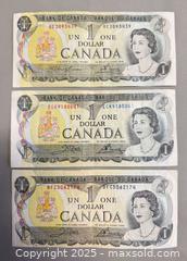 MaxSold Auction: (3) 1973 Collectible Canadian $1 Bills, (2) 1967 Collectible Canadian $1 Bills & More - Toronto (Ontario, Canada) PARTNER MANAGED Reseller Online Auction - Queen Street Wt.