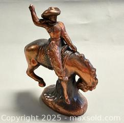MaxSold Auction: (3) Vintage Copper Cowboy Themed Decorative Pieces (Cowboy Bucking Bronco Statue, Cowboy Boots & Boot & Horseshoe Ashtray) - Toronto (Ontario, Canada) PARTNER MANAGED Reseller Online Auction - Queen Street Wt.