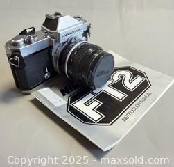 MaxSold Auction: Nikon Nikkormat FT2 35mm Film Camera with User Guide  - Toronto (Ontario, Canada) PARTNER MANAGED Reseller Online Auction - Queen Street Wt.