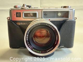 MaxSold Auction: Yashica Electro 35 GSN 35mm Film Camera in Original Case  - Toronto (Ontario, Canada) PARTNER MANAGED Reseller Online Auction - Queen Street Wt.