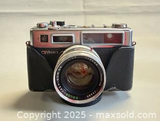 MaxSold Auction: Yashica Electro 35 GSN 35mm Film Camera in Original Case  - Toronto (Ontario, Canada) PARTNER MANAGED Reseller Online Auction - Queen Street Wt.
